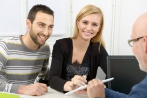 young couple buys a house